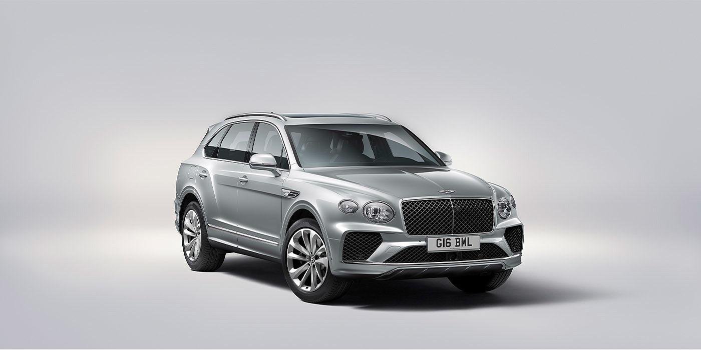 Bentley Jiaxing Bentley Bentayga EWB in Moonbeam paint, front three-quarter view, featuring a matrix grille and elliptical LED headlights.